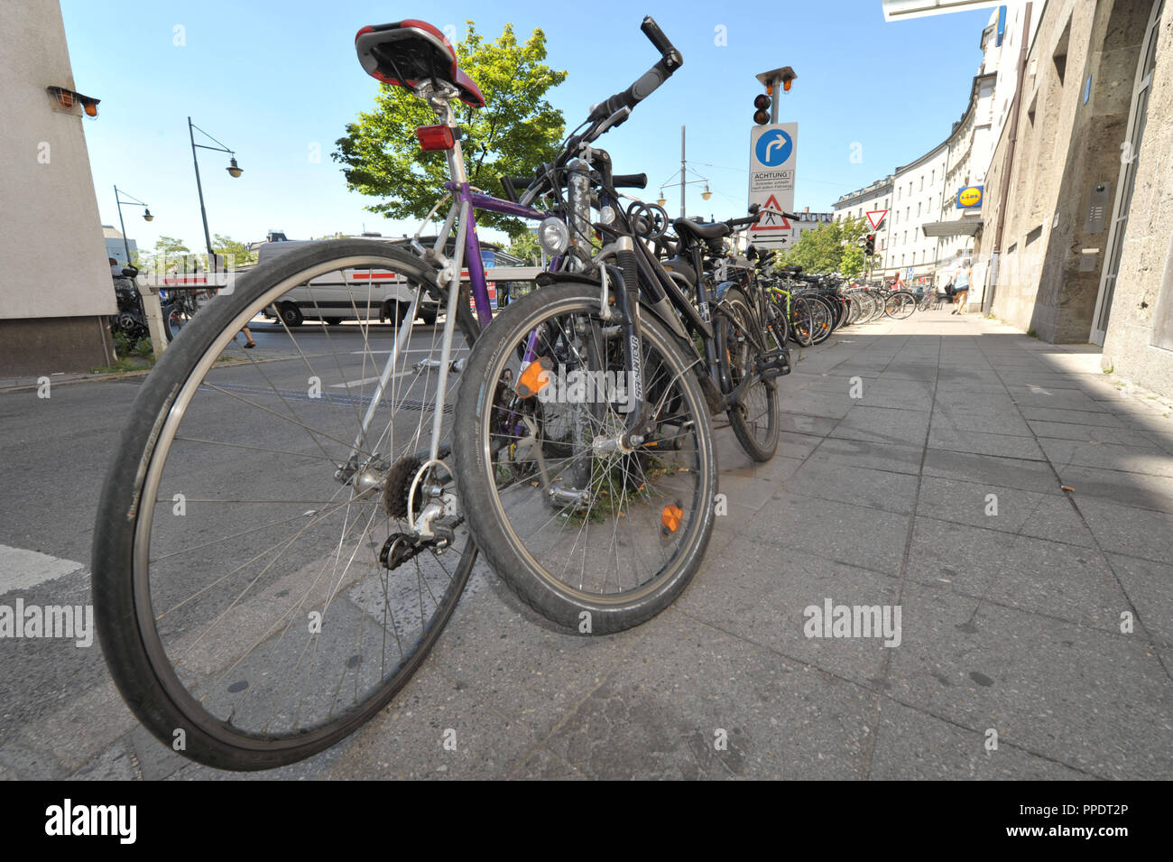 Bicycles parked on pedestrian areas obstruct pedestrians at Munich