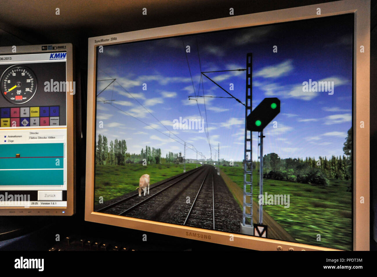 Artificially created 'disturbance' on a screen at the simulation center of Deutsche Bahn in the Aubing-Ost-Strasse 70: a cow stands on the tracks. Stock Photo