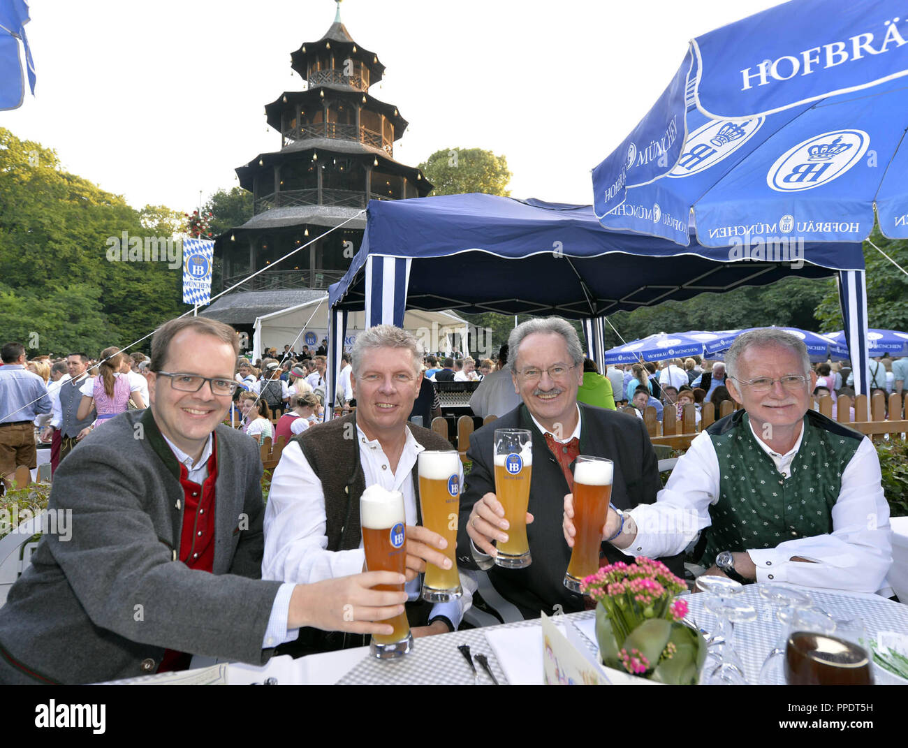The SPD politicians Markus Rinderspacher, Dieter Reiter, Christian Ude and Hans-Ulrich Pfaff man (left to right) at the 25th Kocherlball (Cooks Ball) at the Chinese Tower in the English Garden. Stock Photo