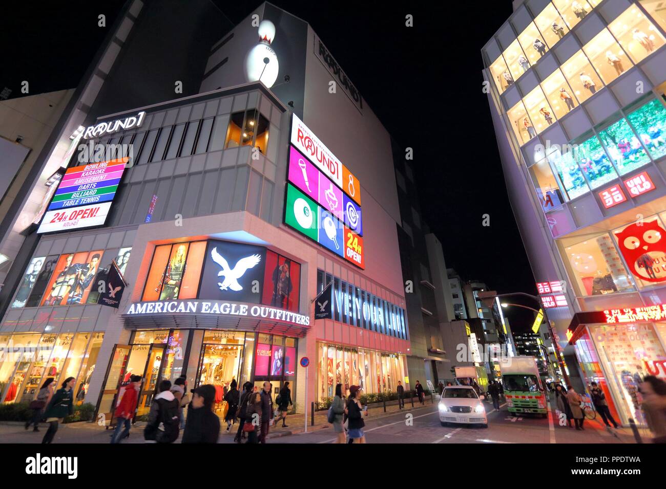 TOKYO, JAPAN - NOVEMBER 29, 2016: People visit night Ikebukuro district of Tokyo, Japan. Tokyo is the capital city of Japan. 37.8 million people live  Stock Photo