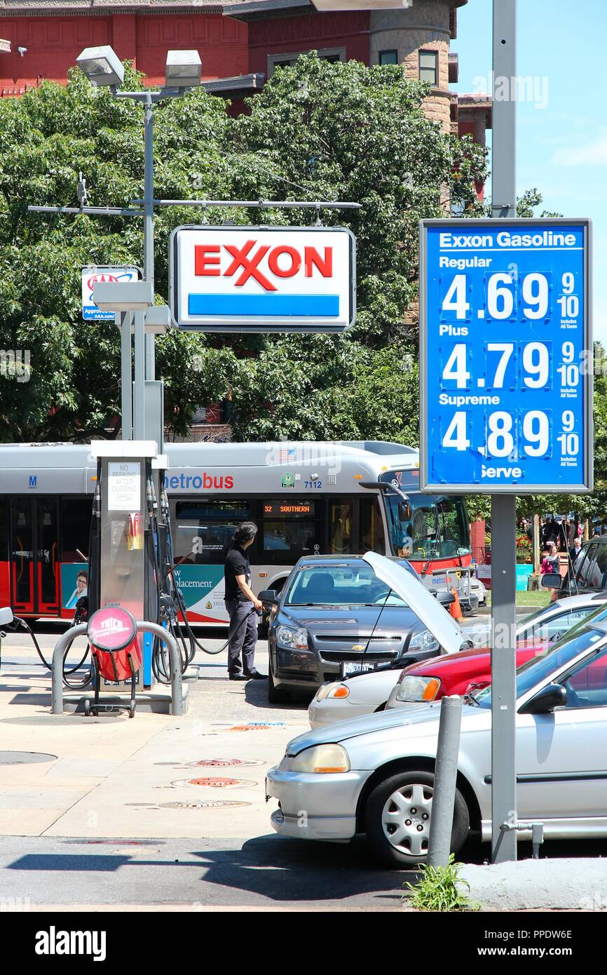 WASHINGTON, USA - JUNE 14, 2013: People visit Exxon gas station in Washington, DC, USA. ExxonMobil is the 3rd largest company in the world by revenue  Stock Photo