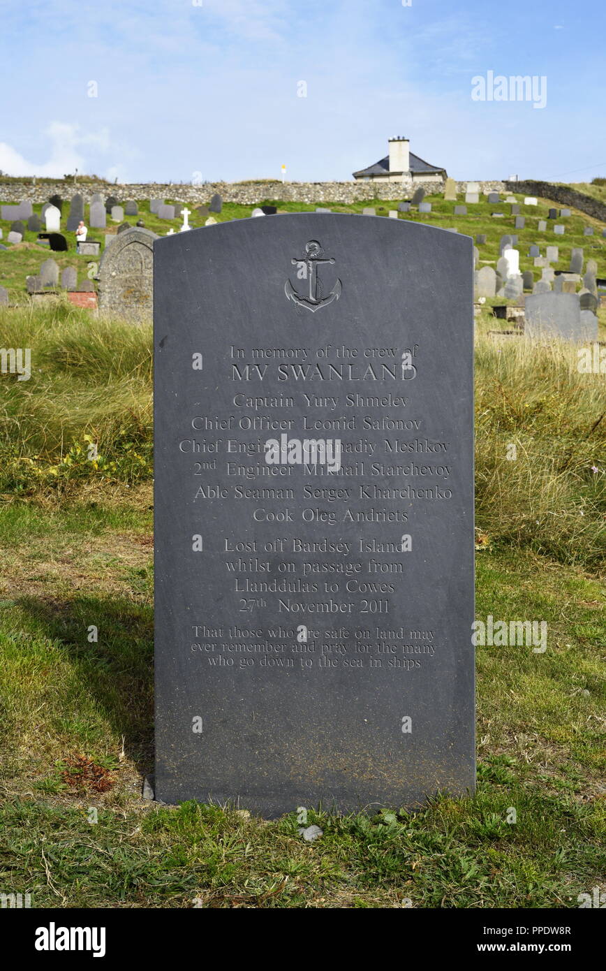 Stone memorial to sailors lost at sea on the MV Swanland in 2011. It is located in the graveyard of the St Hywyn’s Church, Aberdaron, Llyn Peninsula,  Stock Photo