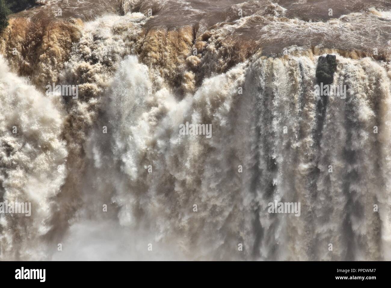 Muddy water in Iguazu Falls. Brazil nature. Stock Photo