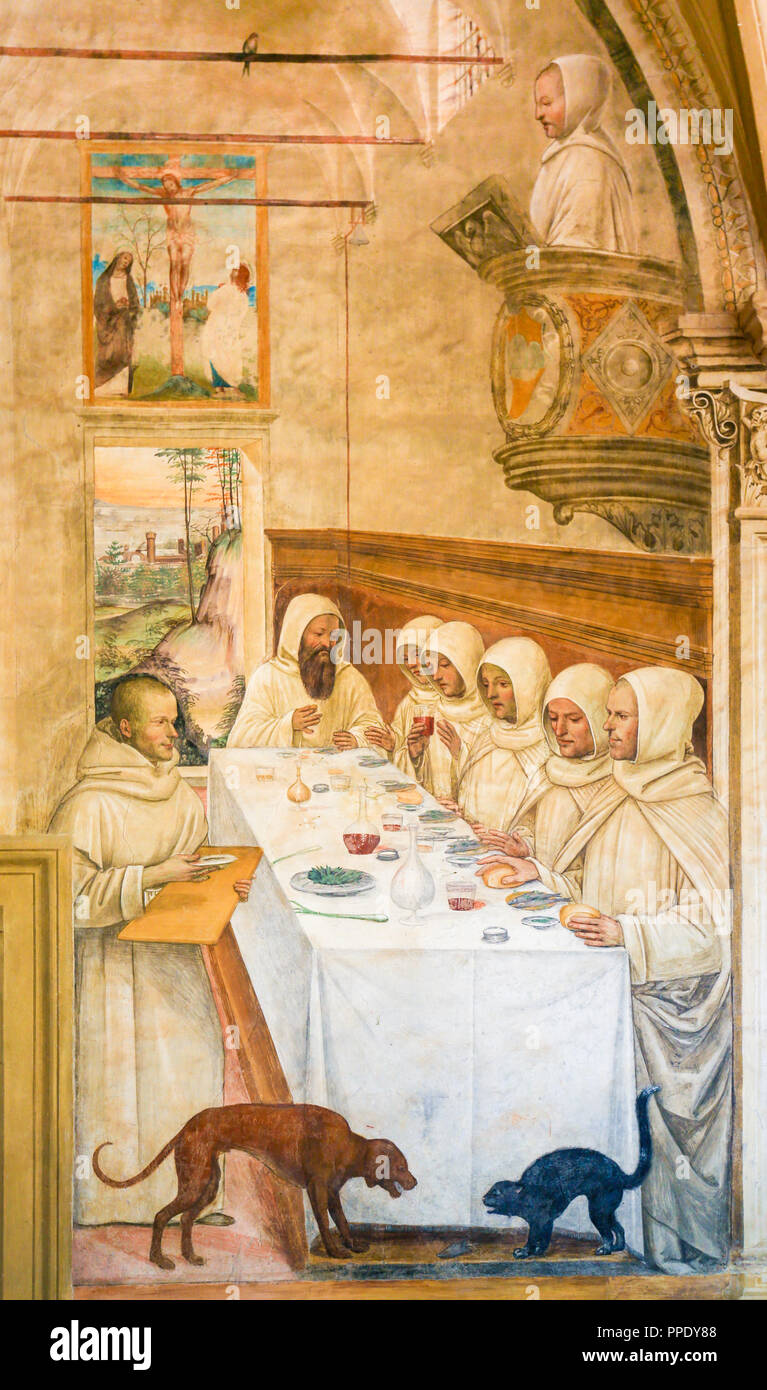 Fresco in the Monastry of Monte Oliveto Maggiore, near Siena, Tuscany, Italy, depicting a Scene in the Life of Saint Benedict, feeding the monks. Stock Photo