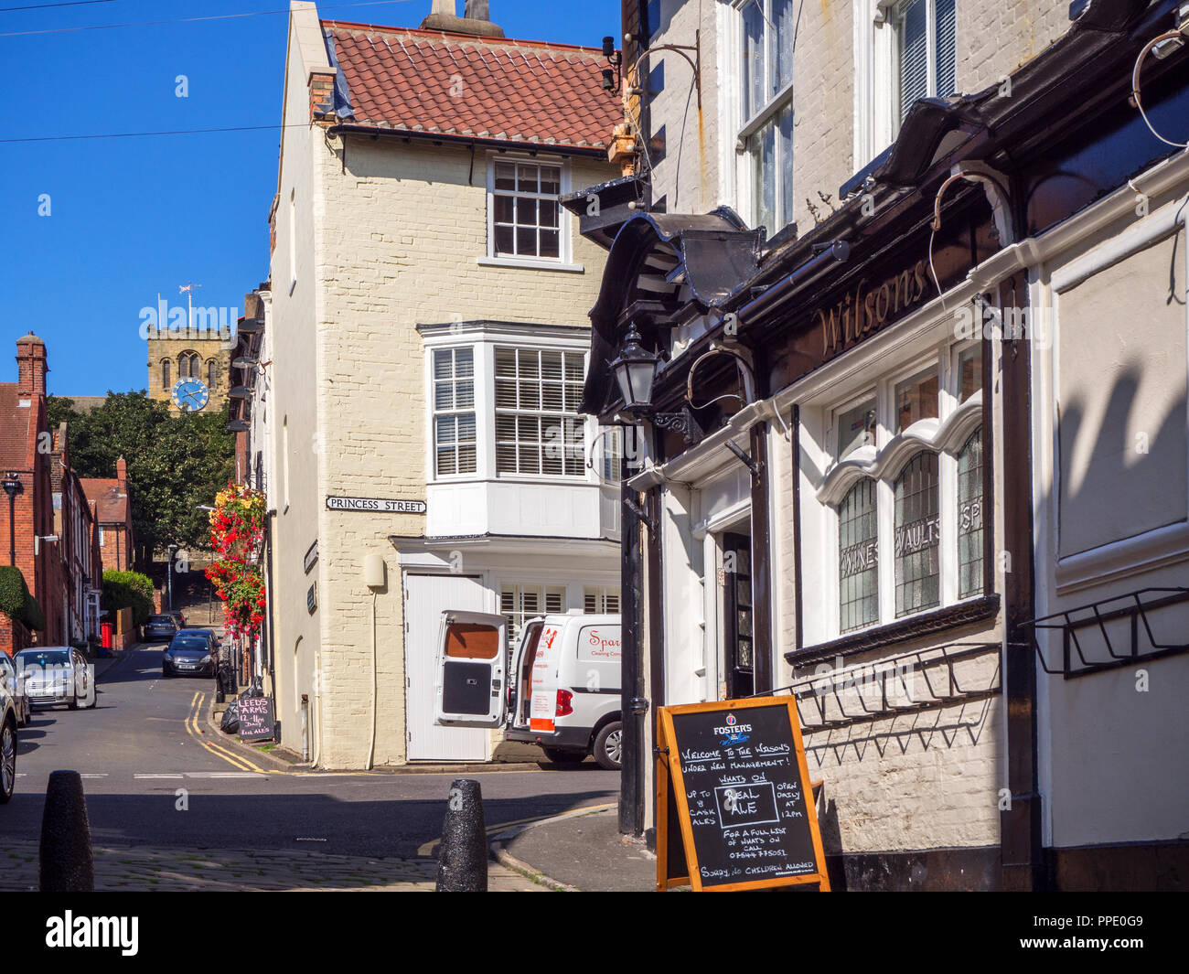 View along St Marys Street to St Marys Church in the Old Town at Scarborough North Yorkshire England Stock Photo