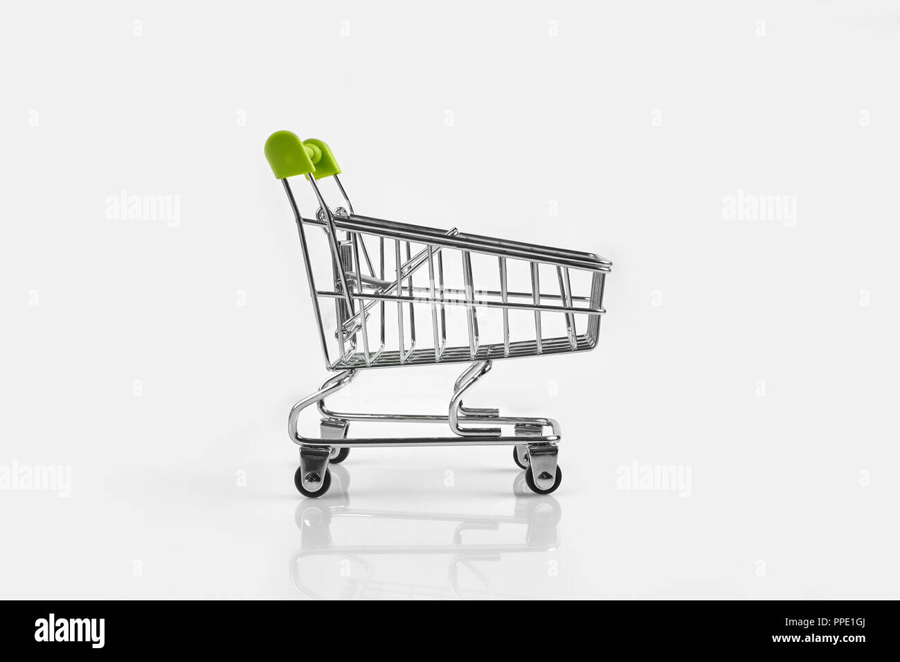 Close up of supermarket grocery push cart for shopping with black