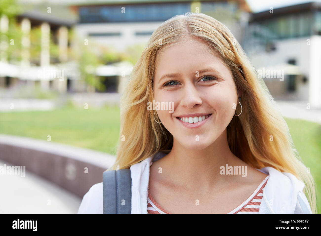 Portrait Of Female High School Student Outside College Buildings Stock Photo