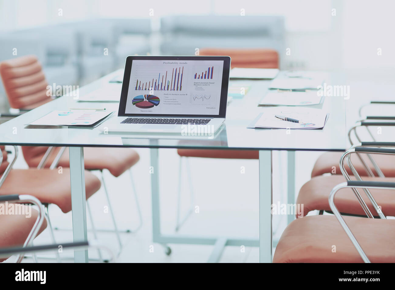 laptop and financial reports on the Desk of a businessman Stock Photo ...