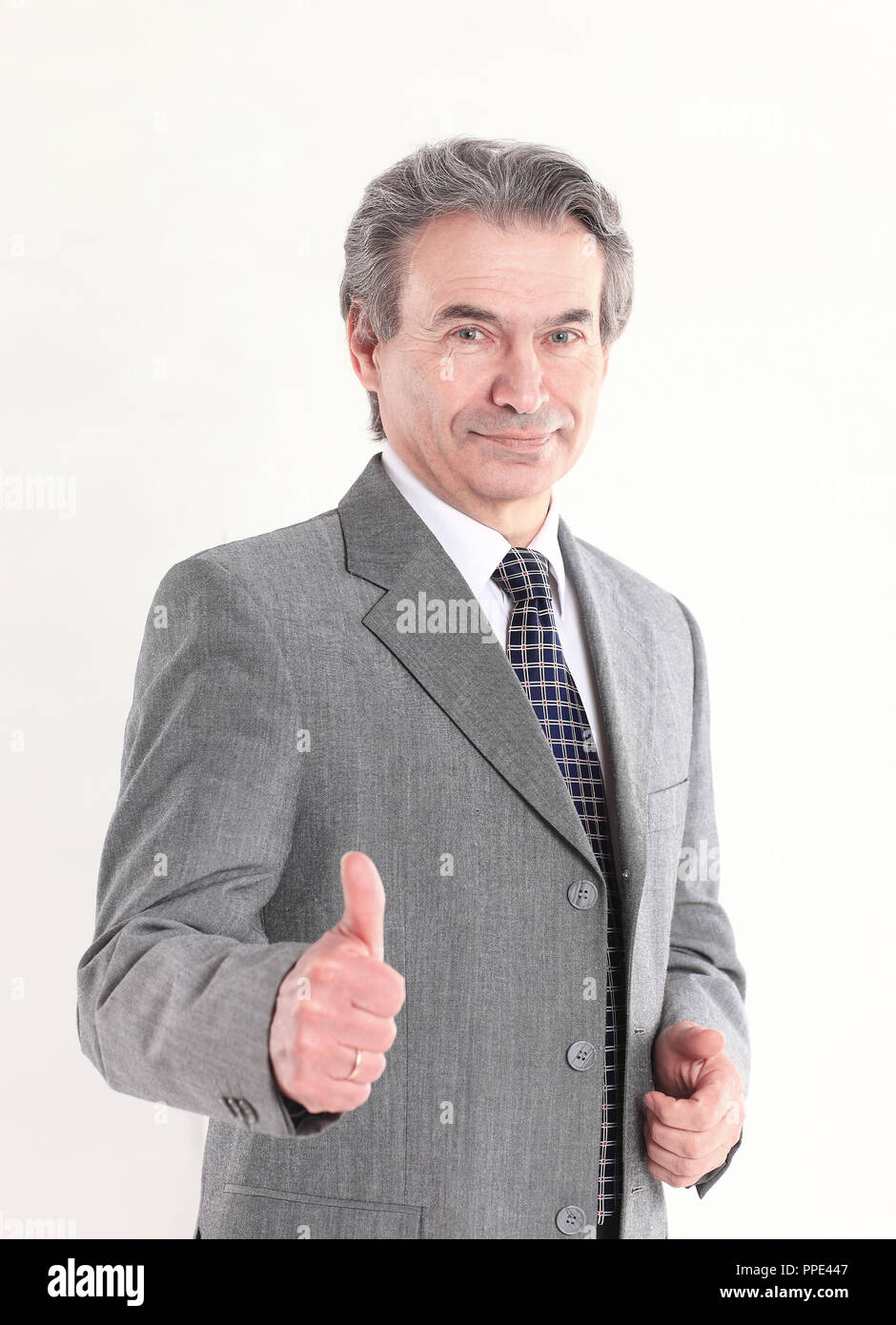 confident businessman shows thumb up.isolated on white background Stock ...
