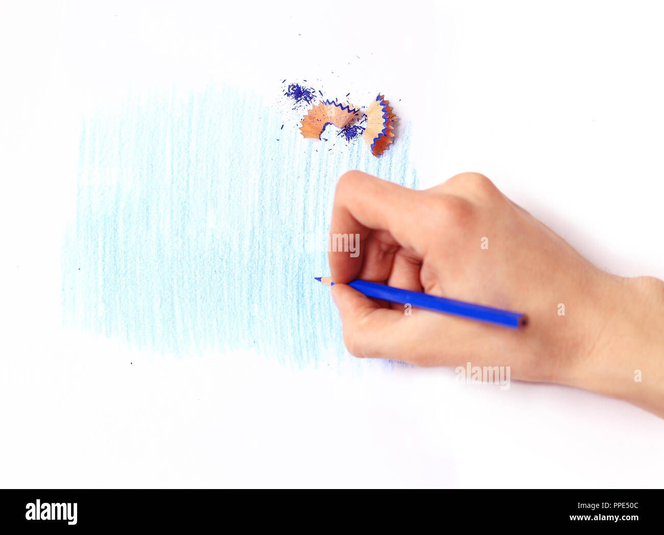 Blue pencil in hand isolated on white background Stock Photo - Alamy