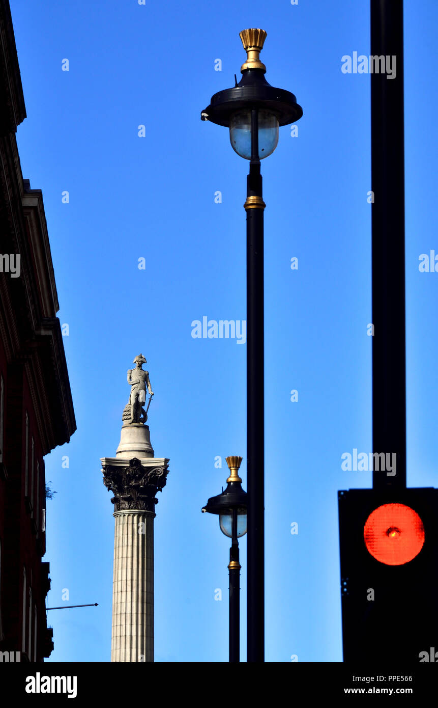 Nelson's Column, lampposts and traffic lights in Whitehall, Westminster, London, England, UK. Stock Photo