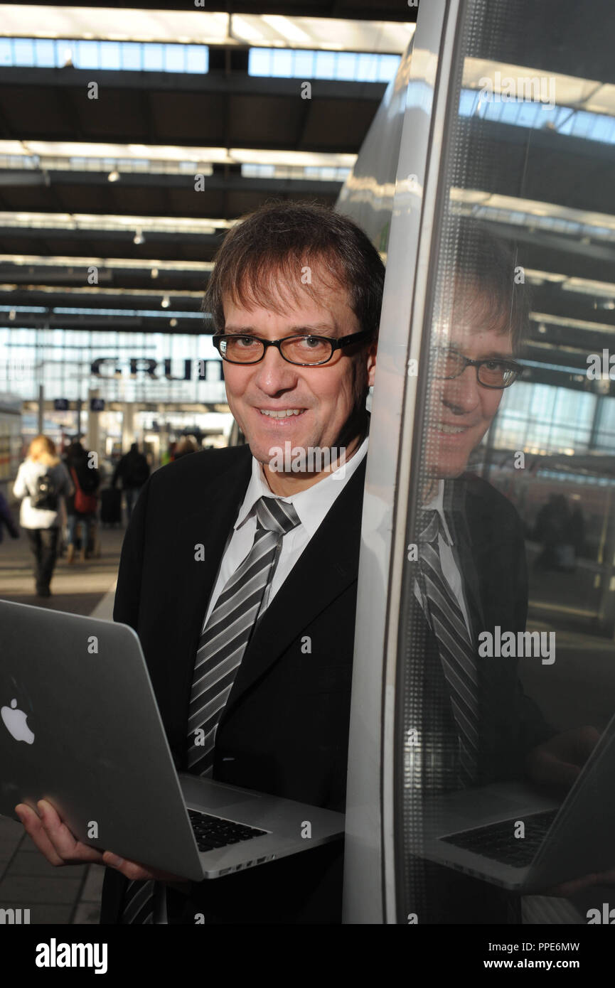 Prof. Dr. Stefan Pickl, Professor of Operations Research at the Bundeswehr University Munich and coordinator of the research project 'Rikov' (risks and costs of the terrorist threat of rail-bound public passenger transport), taken in front of an ICE in Munich's main station. Stock Photo