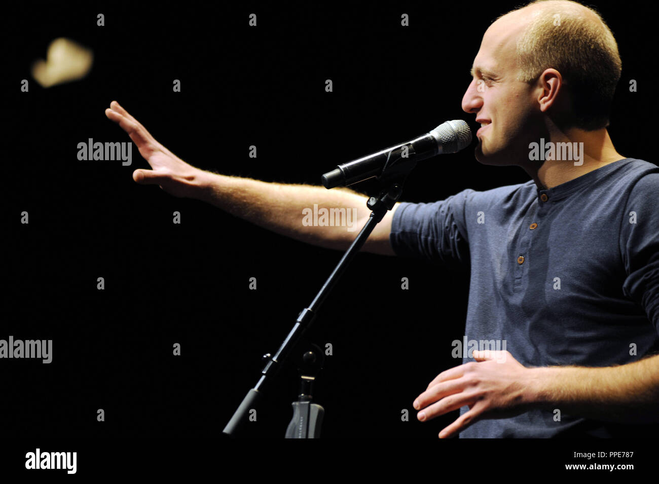 Winner Alex Burkhard at the Munich Poetry Slam Championship 2015 at the Volksstheater. Stock Photo