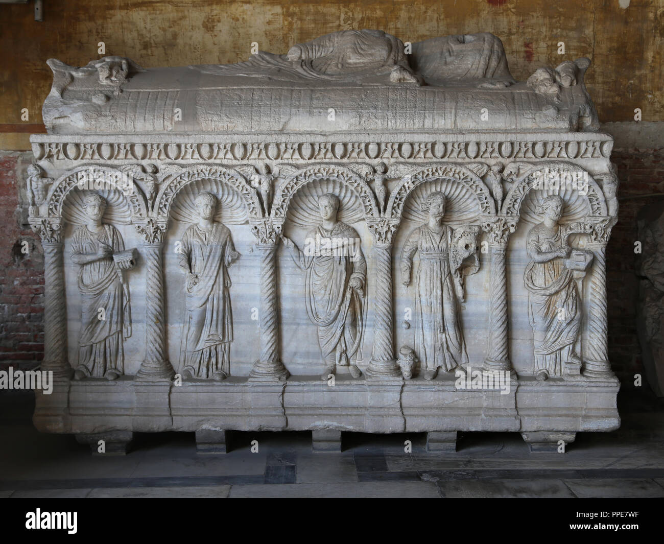 Italy. Pisa. Campo Santo. Roman sarcophagus decorated with mythological figures,  The Muses. c. 250. 3rd century. Tuscany. Stock Photo