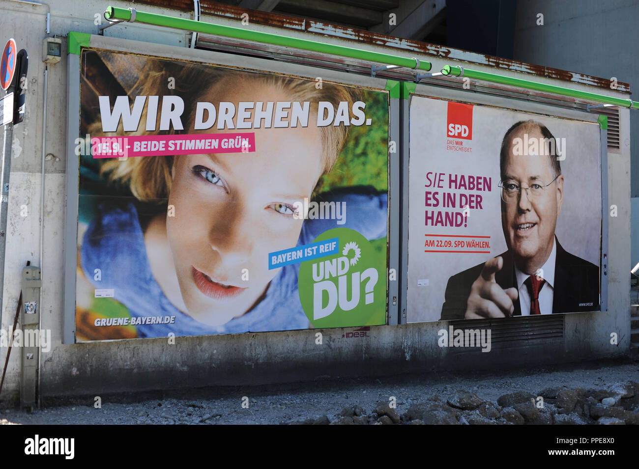 State election and federal election in 2013: An election poster of SPD chancellor candidate Peer Steinbrueck hangs in the center of Munich next to a poster of Alliance 90 / The Greens. Stock Photo