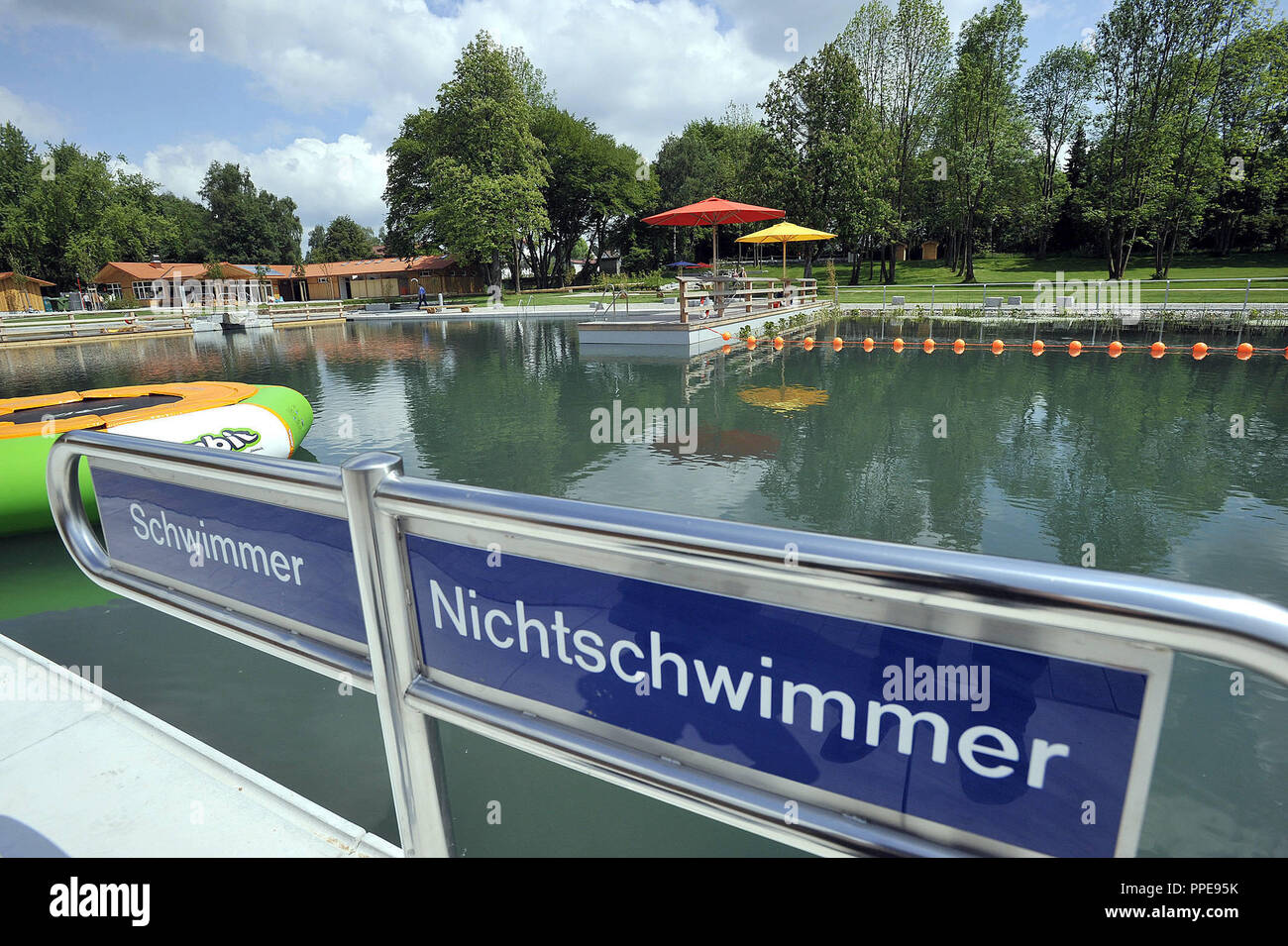 Swimmers and non-swimmers' area in the Naturbad Furth (Natural Bath Furth) at Oberhaching few days before the opening. Stock Photo