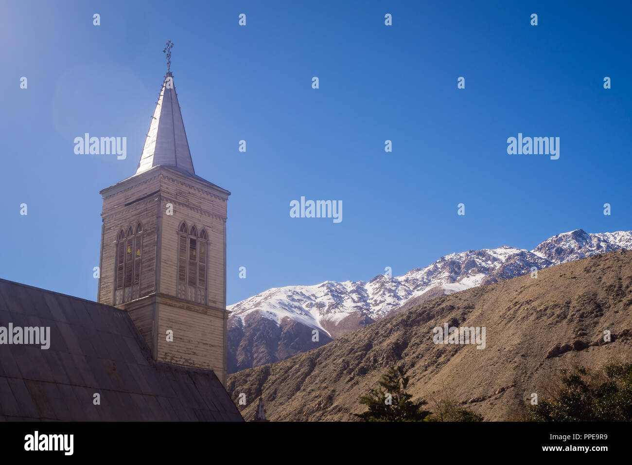 Church with Andes mountains in the background in Pisco Elqui in the Elqui Valley in Chile, snow Stock Photo
