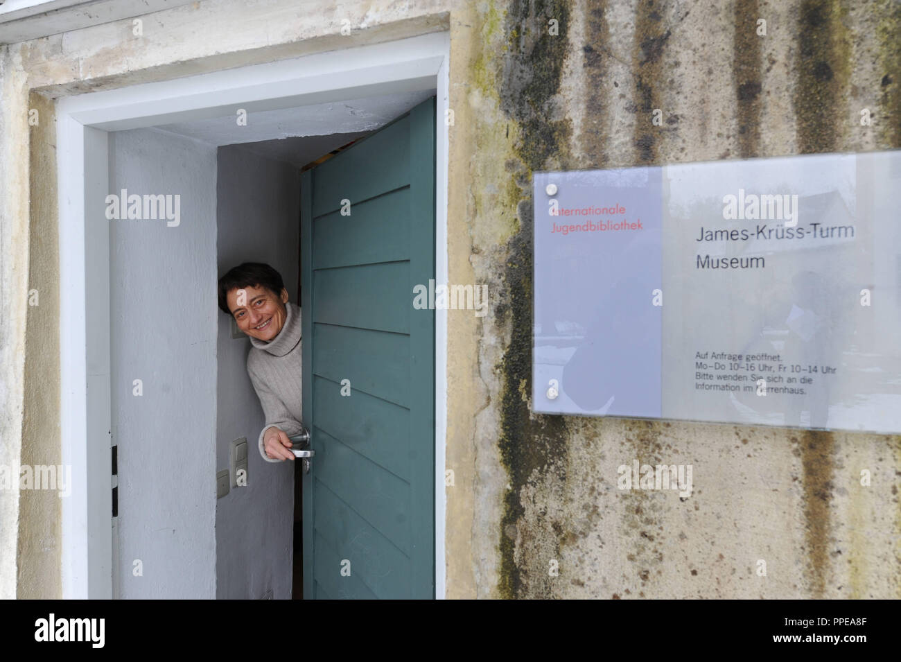 Jutta Reusch, head of the International Youth Library in Blutenburg Castle at the entrance to the James Kruess Museum. Stock Photo