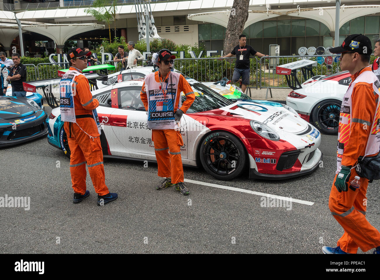 Porsche 911 GT3 Racing Cars Participating in the Porsche Carrera Cup Asia at the Marina Bay Street Circuit Singapore Asia Stock Photo