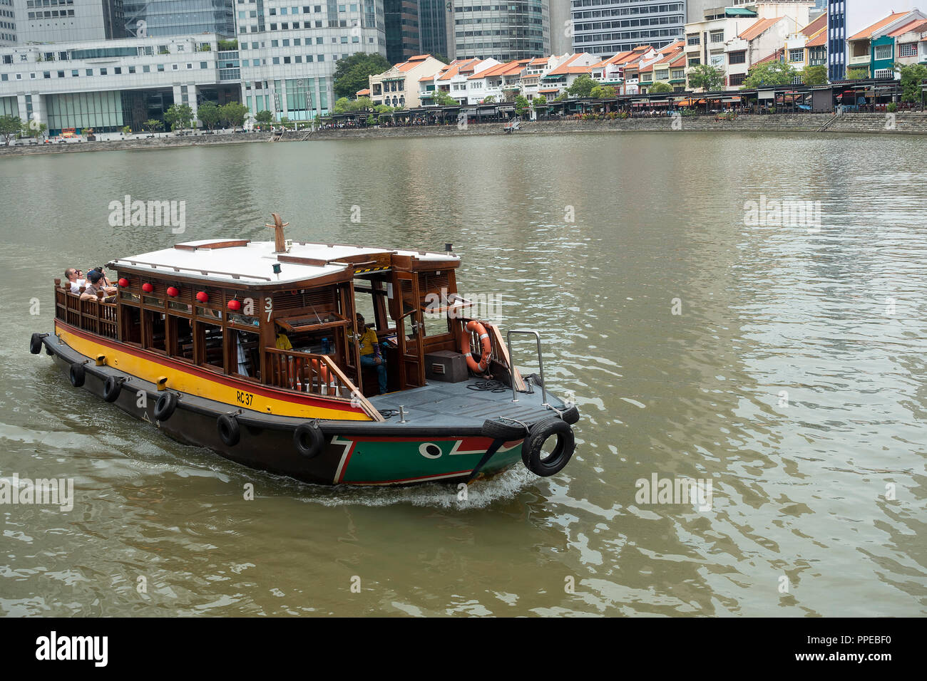 The Beautiful Boat Quay Housing Restaurants with Passenger Taxi Boat on