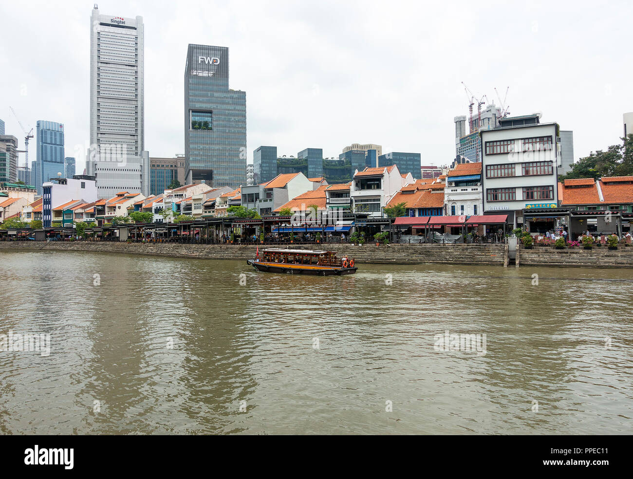 The Beautiful Boat Quay Housing Restaurants with Passenger Taxi Boat on