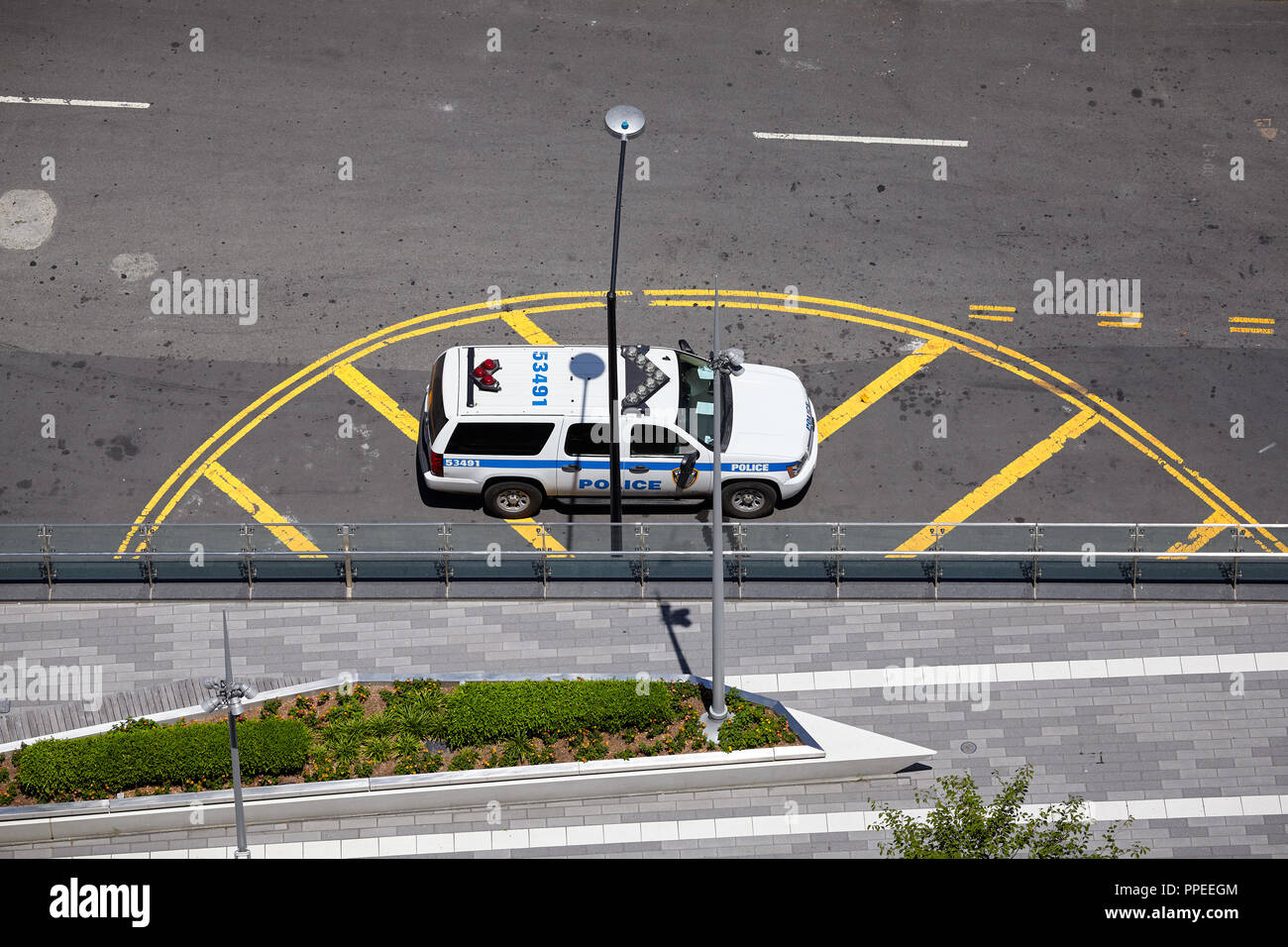 New York, USA - July 05, 2018: Aerial view of a Police vehicle parked on a street in downtown Manhattan. Stock Photo