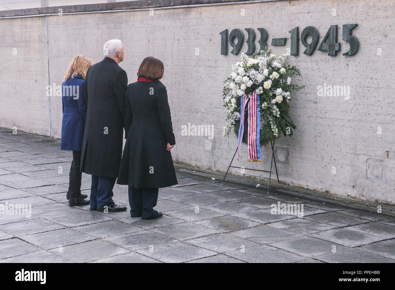 The US Vice-President Mike Pence and his family visit the Dachau Concentration Camp Memorial Site and lay a wreath at the memorial for the victims. Stock Photo