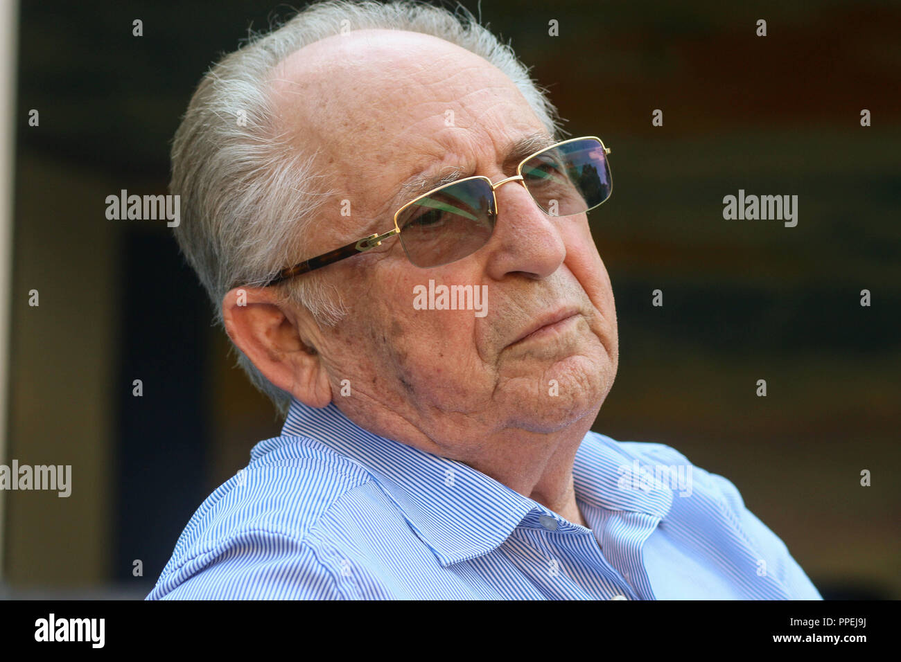 Abba Naor, a witness of the past who as a child, survived the ghetto in Kaunas in Lithuania as well as three concentration camps of the National Socialists, during a conversation in the Jugendgaestehaus Dachau. Stock Photo
