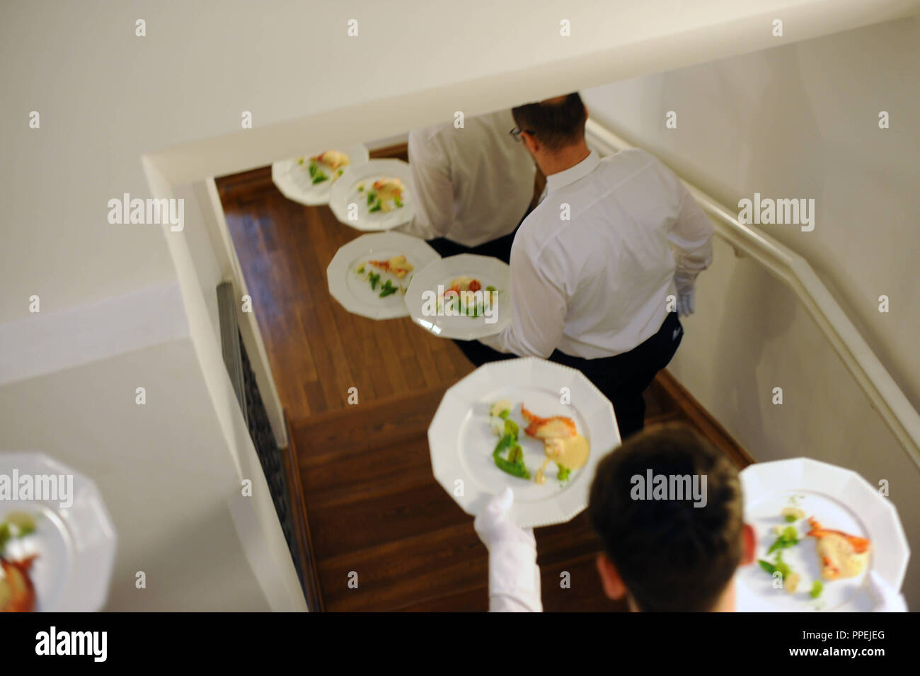 Employees Of The Luxury Caterer Dahlmann Catering Serve The Guests Of The Swiss Luxury Watch Manufacturer Patek Philippe At A Reception In The Nymphenburg Porcelain Manufactory Stock Photo Alamy