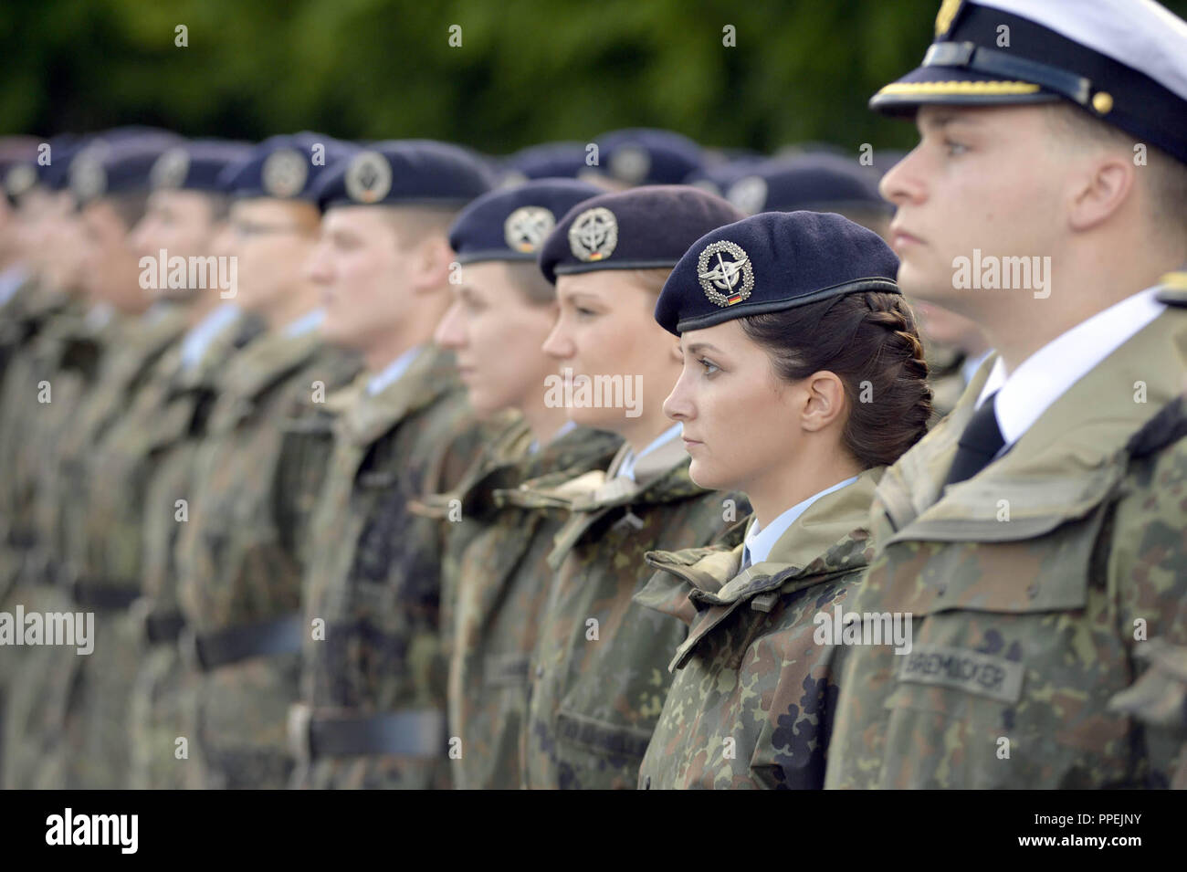 Officials of the Bundeswehr during the solemn roll call on the Open Door Day at the University of the Bundeswehr in Neubiberg. Stock Photo