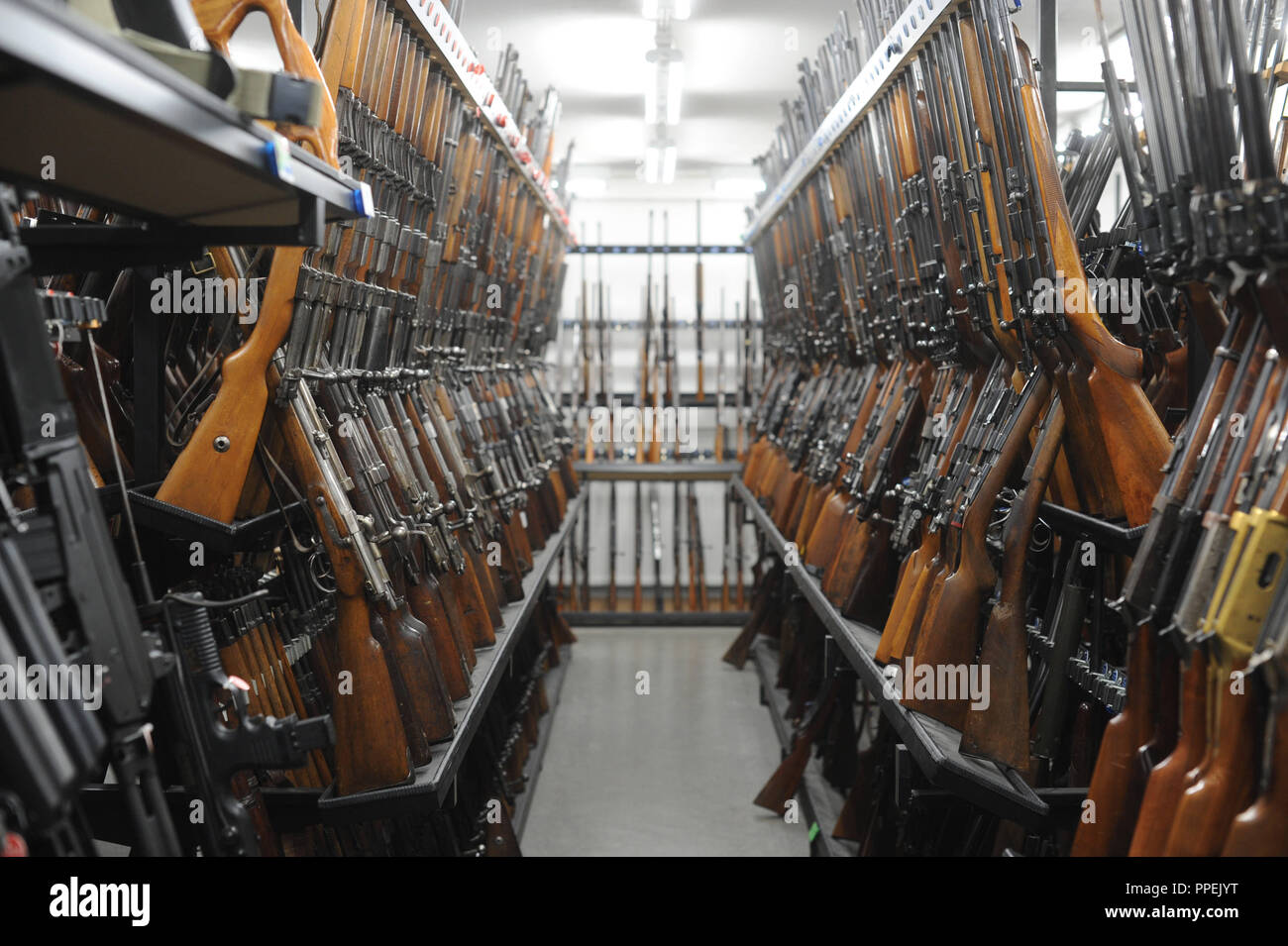 Pistols, revolvers, guns in the armory (8,000 weapons) of the forensics