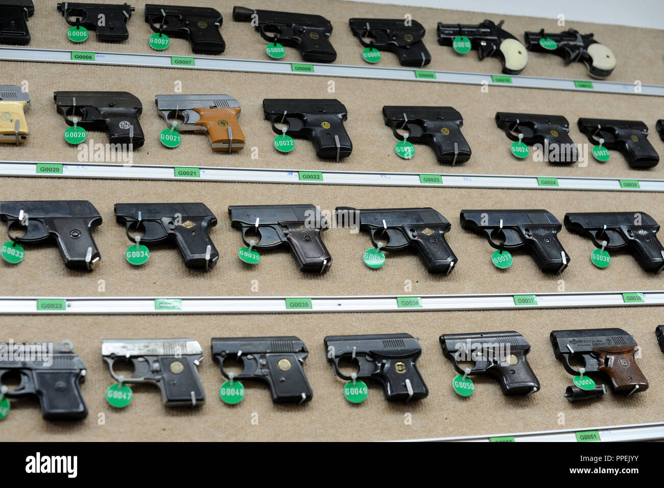 Pistols, revolvers, guns in the armory (8,000 weapons) of the forensics