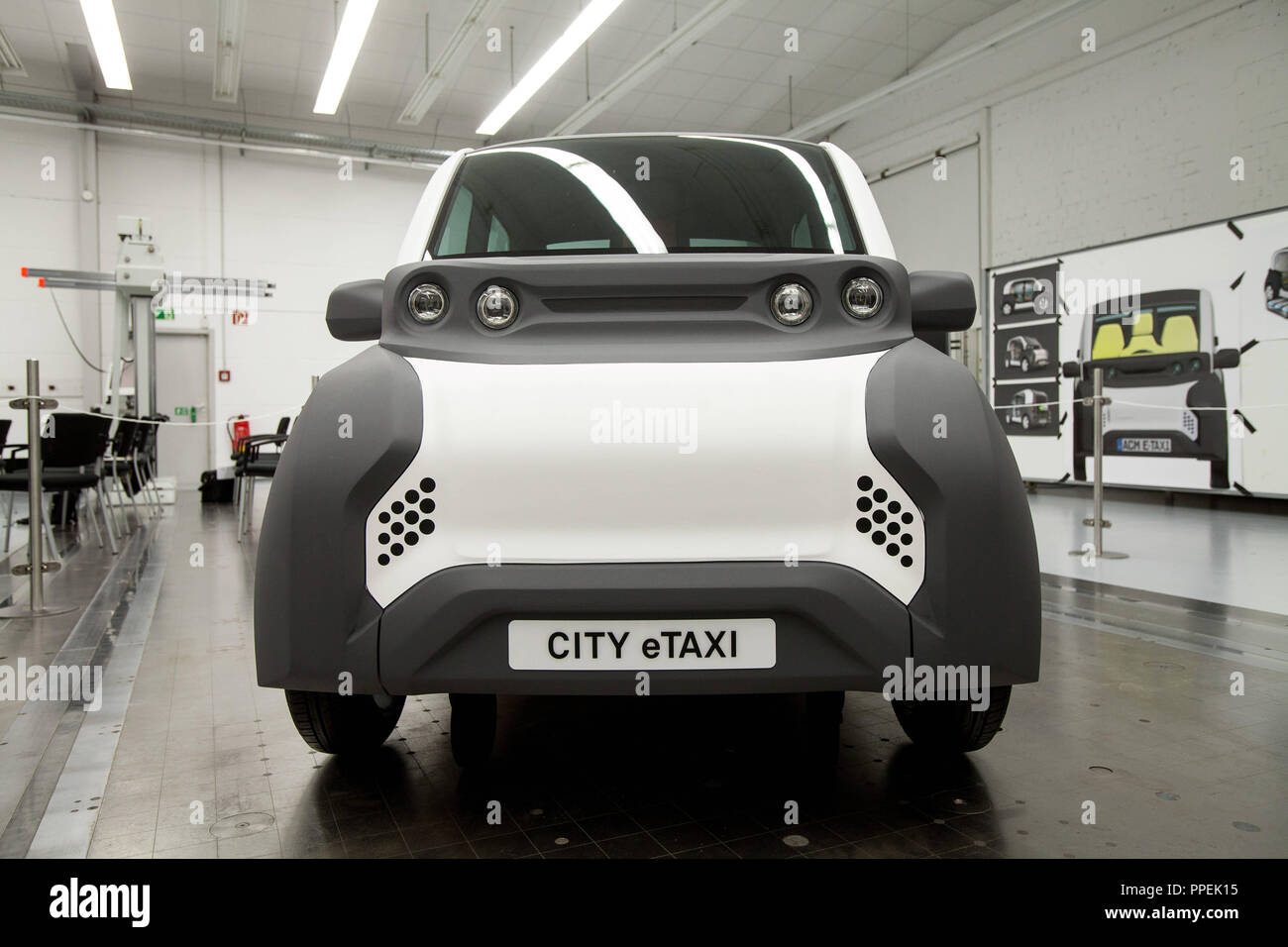 As part of the car project 'Adaptive Mobility City' about a dozen companies work together on an electric mini cab that should drastically reduce CO2 emissions in the taxi industry. Presentation of the first CITY eTAXI design study in the prototype production hall of Volke Consulting in Munich. Stock Photo