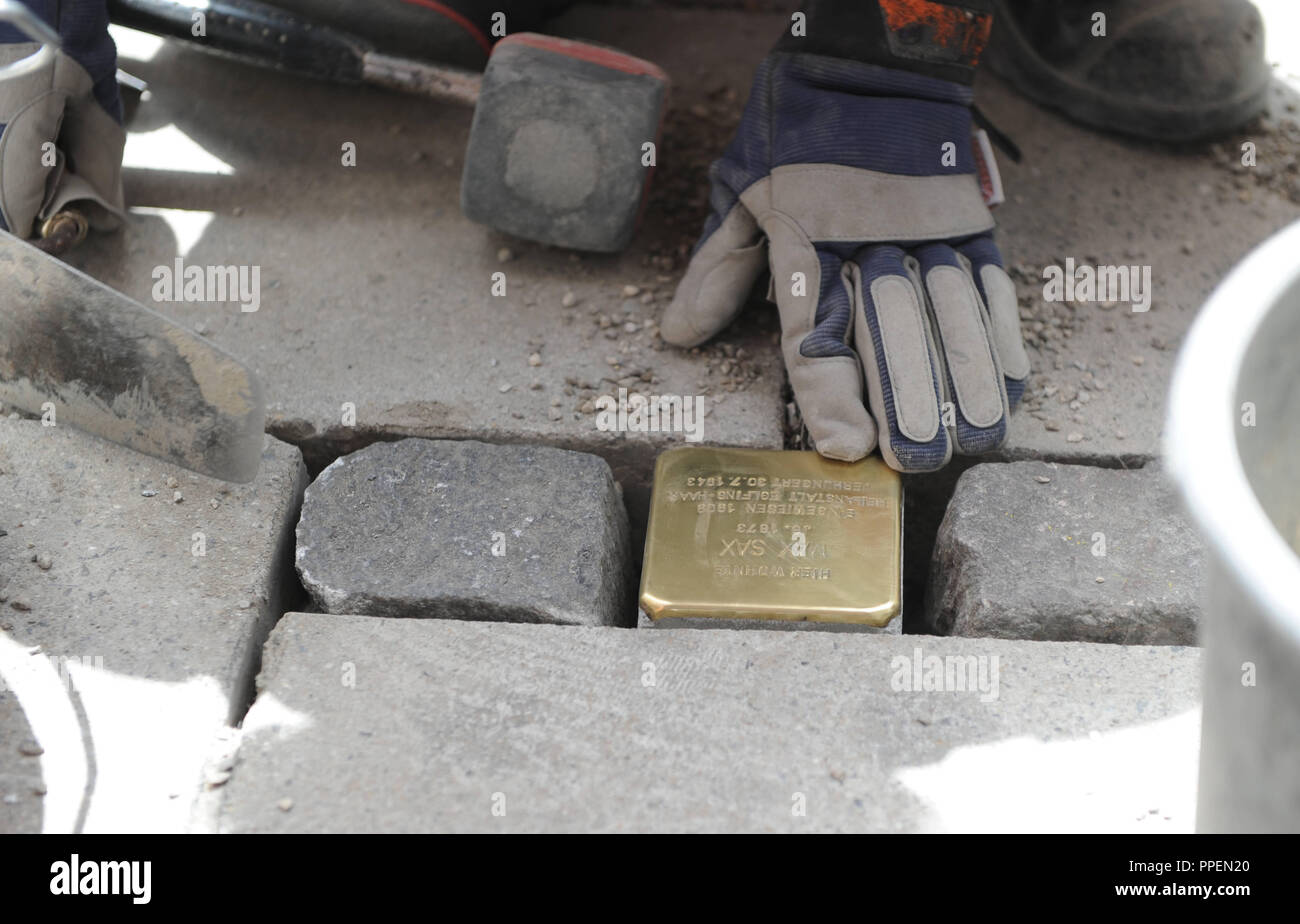 The 27th Stolperstein (cobblestone-sized memorial) in the city of Munich on private property in the von-der-Tann-Strasse 7 is devoted to Max Sax, who was murdered in a psychiatric ward in 1943. Stock Photo