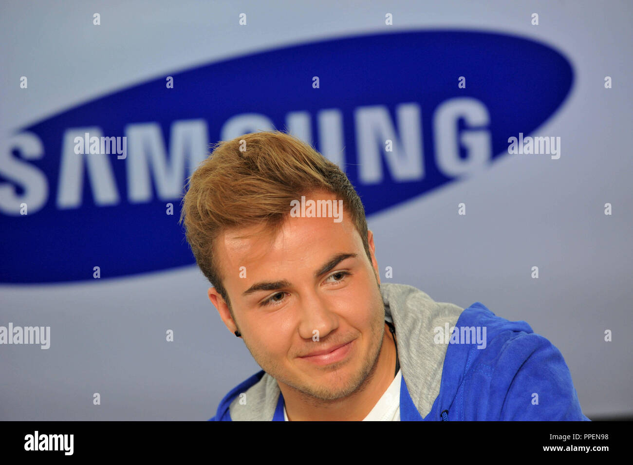 Mario Goetze advertises the new curved TV from Samsung at a PR gig in Munich. Stock Photo