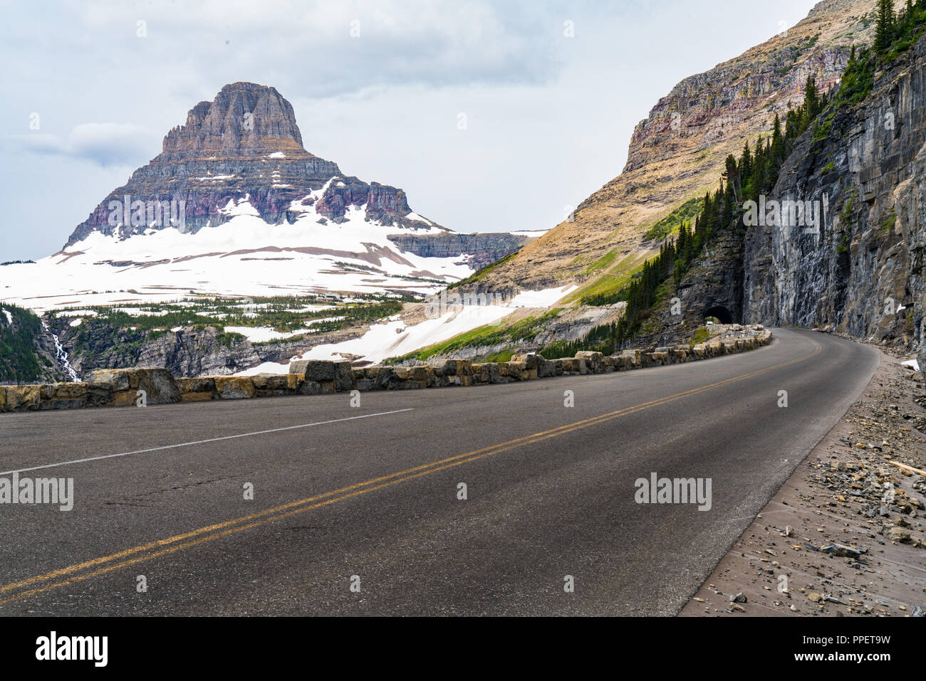 Going to the Sun Road carved into the mountains in Glacier National Park, Montana Stock Photo