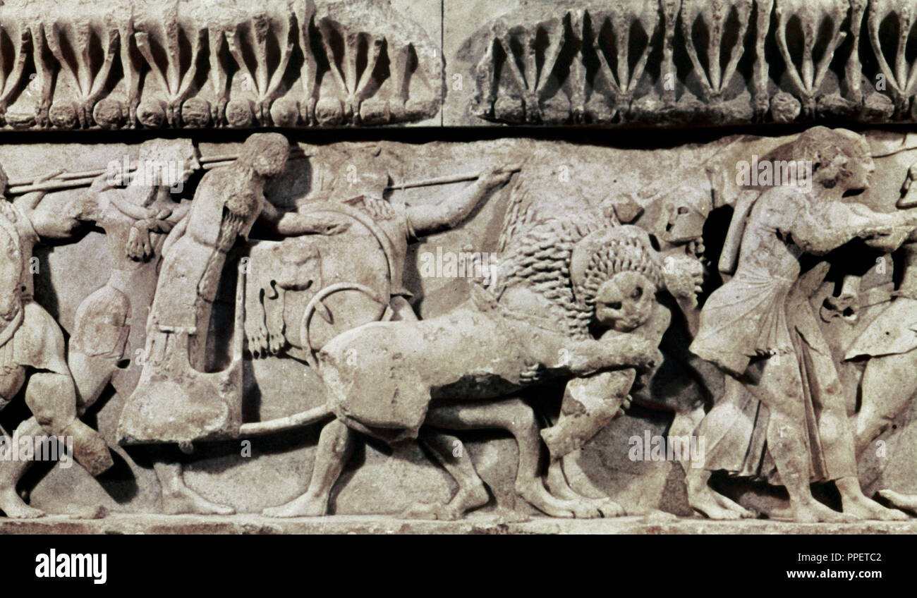 Treasury of Siphnos (525 B.C.). Detail from the north frieze that depicts the battle between gods and giants. Delphi Archaeological Museum. Greece. Stock Photo