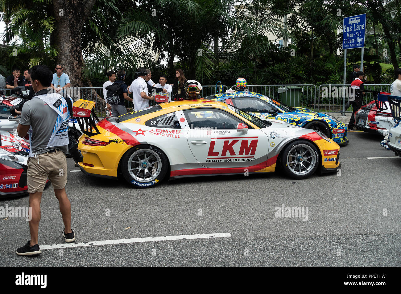 Porsche 911 GT3 Racing Cars Participating in the Porsche Carrera Cup Asia at the Marina Bay Street Circuit Singapore Asia Stock Photo