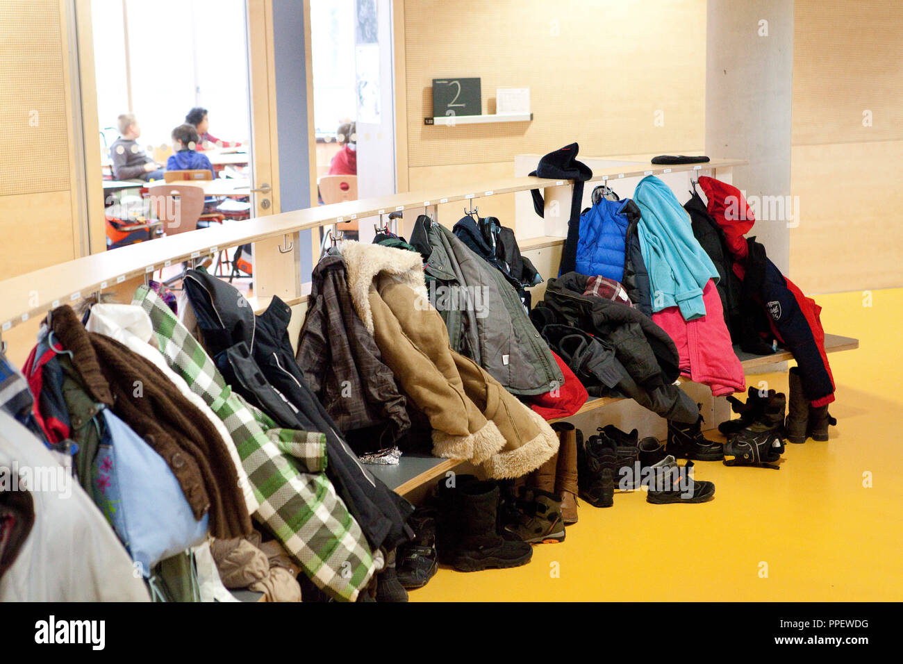 School in Motion: disabled access building of the Ernst-Barlach-schools of Stiftung Pfennigparade at Barlachstrasse 36-38 in Schwabing. In the picture, jackets in the cloakroom before a classroom Stock Photo
