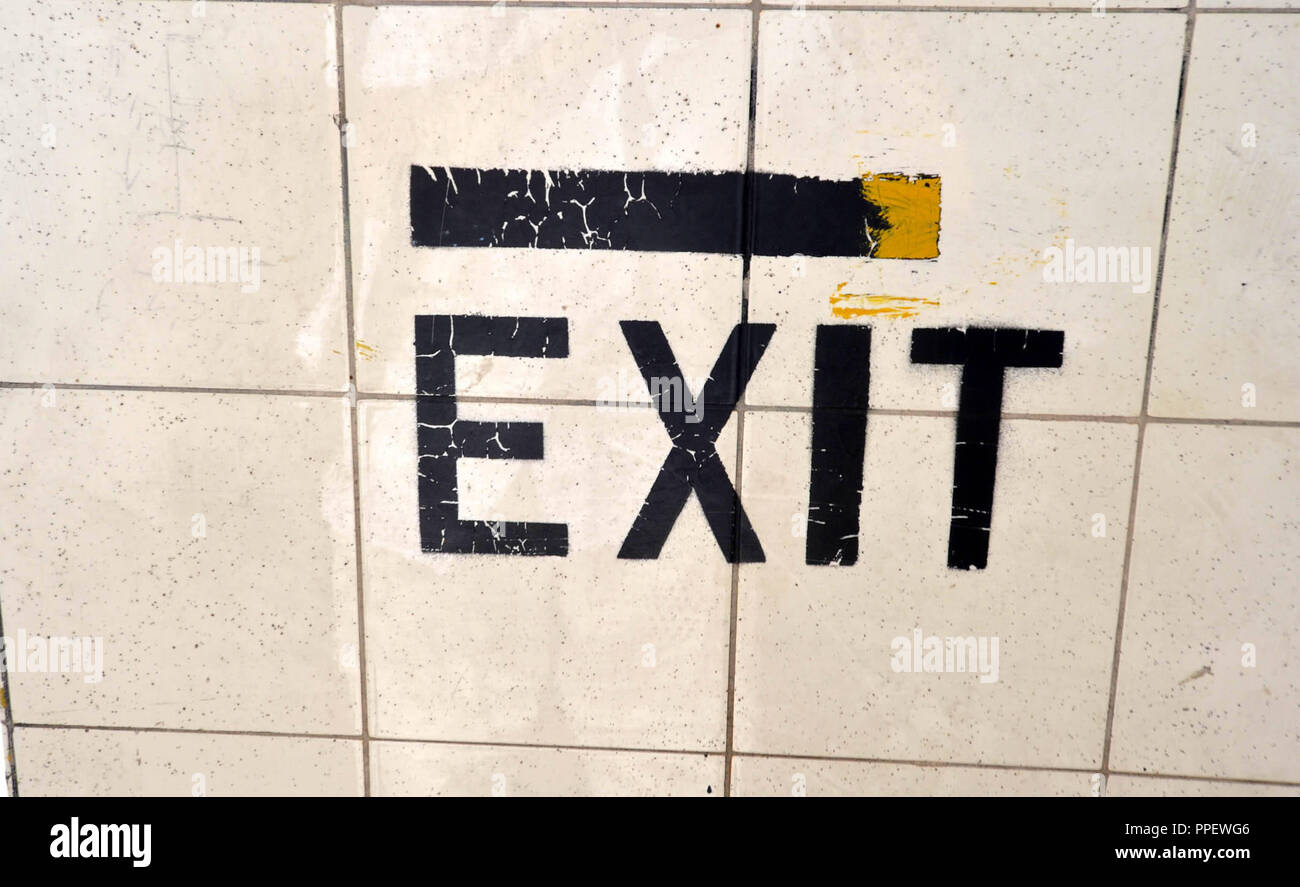 Exit sign in the building of the closed McGraw Kaserne in Munich Giesing. The building of the former Reichszeugmeisterei hosted the South German headquarters of the U.S. Army between 1945 and 1992. Stock Photo