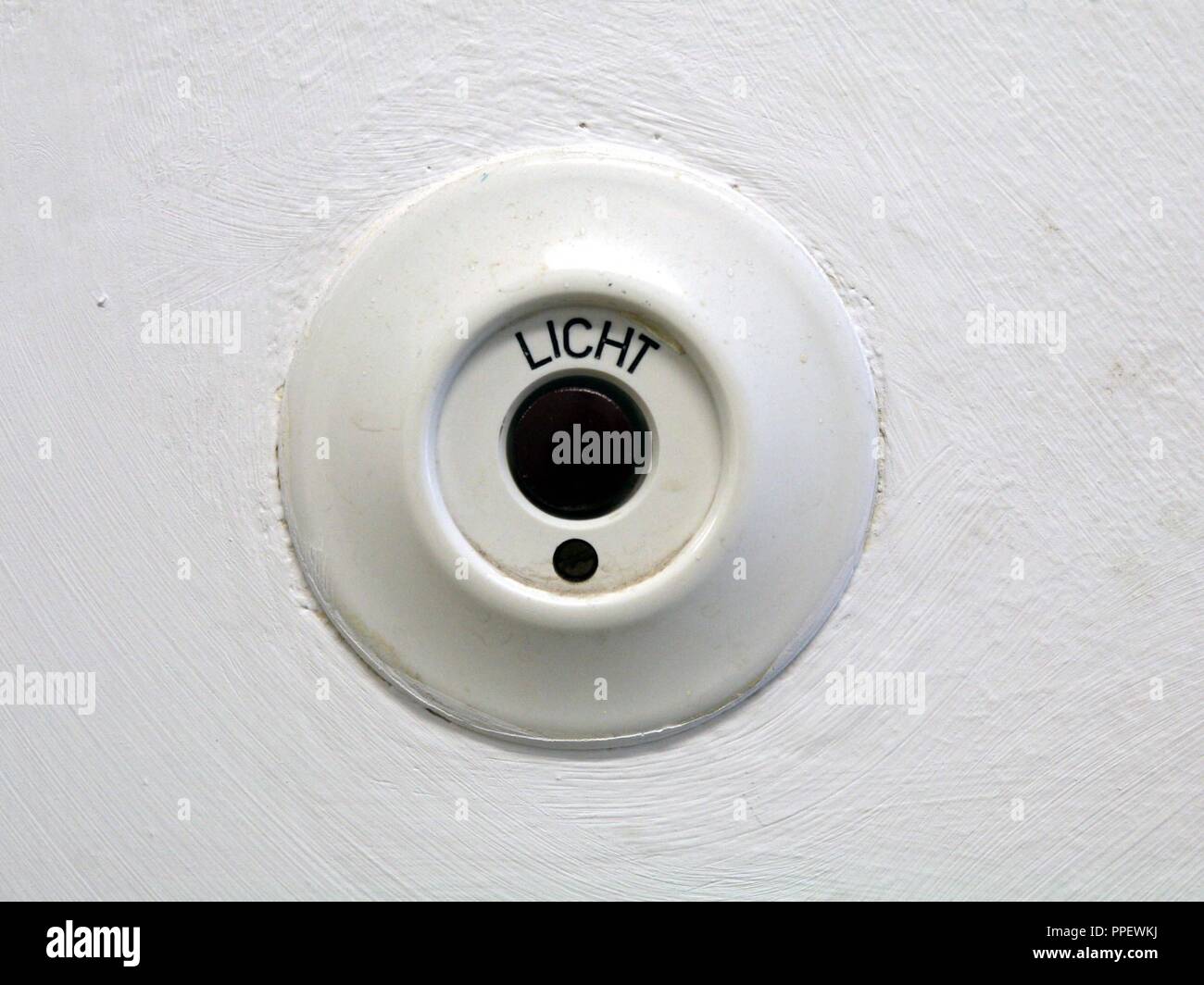 Nearly historical light switch in the old court prison in Building 2 of the Dachau District Court. Stock Photo