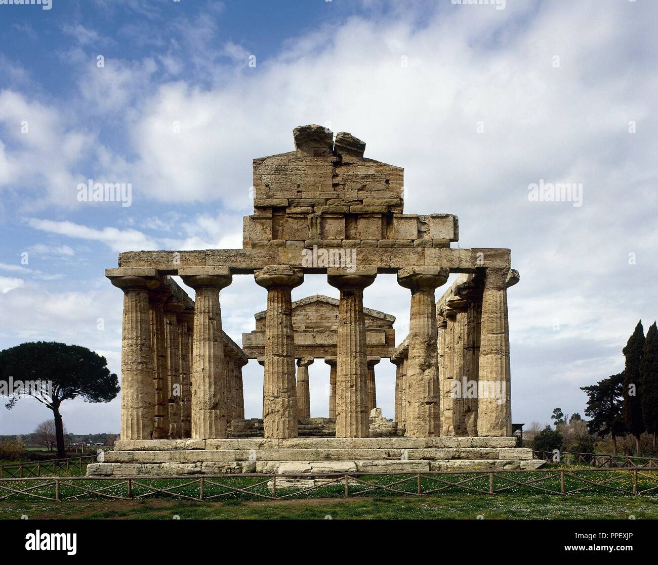 Greek Art. Magna Graecia. Paestum.Temple of Athena. It was built around 500 BC. The architecture is transitional, being partly in the Ionic style and partly early Doric. Facade. Outside. Stock Photo