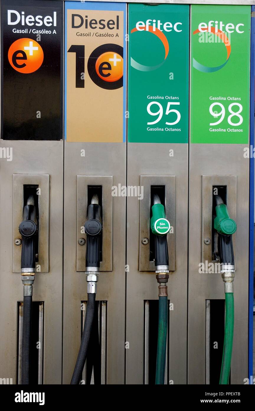 PETROL PUMP. Detail of the hoses of different types of fuel, differentiated by colors. Spain