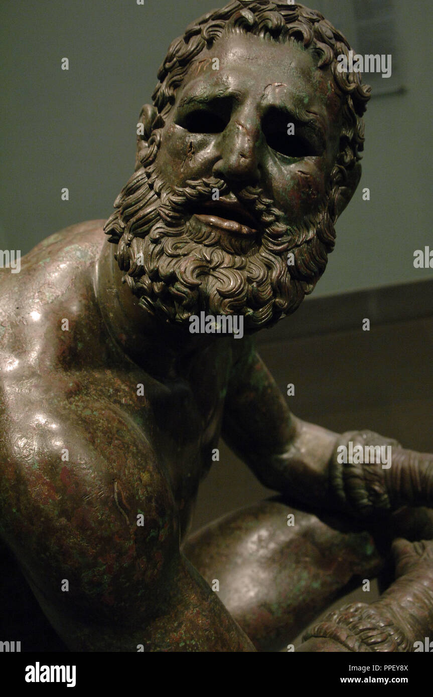 Greek Art. Hellenistic. Boxer of Quirinal or the Terme Boxer. Bronze sculpture of the Hellenistic period (1st century B.C.). Boxer sitting at rest, with metal and leather dressings used for combat. Palazzo Massimo. National Roman Museum. Rome. italy. Stock Photo