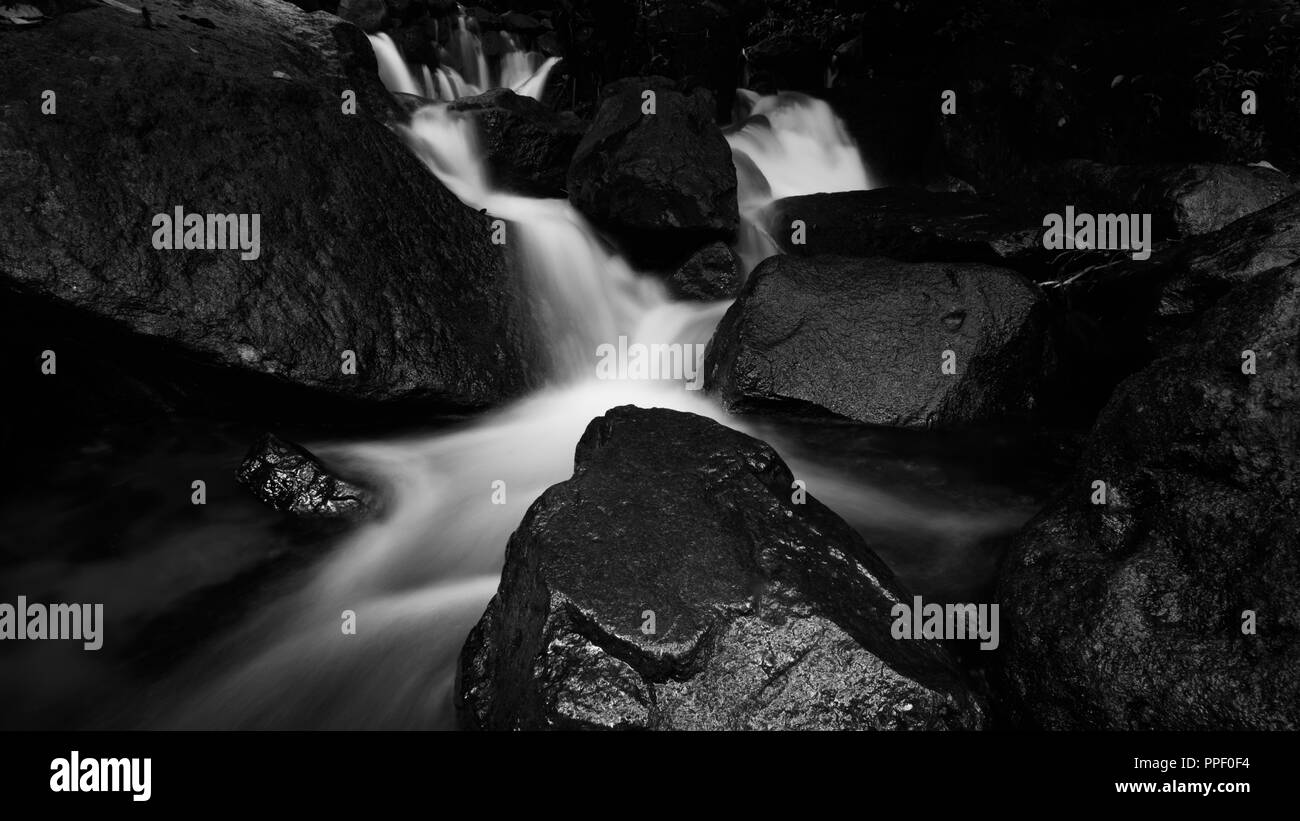 River flows through the rocks Stock Photo
