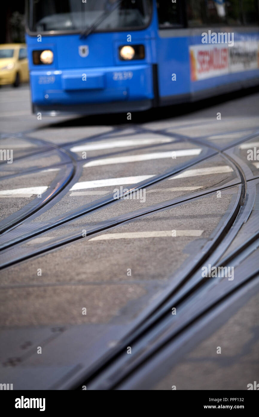 Two trams cross the Leonrodplatz in Munich. Planners of 'Arbeitskreis Attraktiver Nahverkehr' (AAN) (Working group for improving local traffic) want to connect the tram lines in the city. Stock Photo