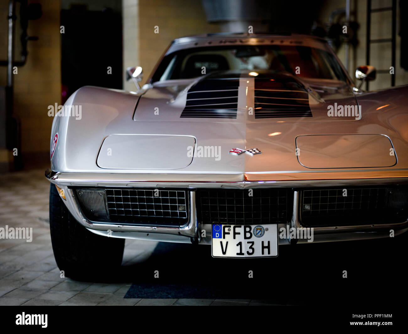 Christian Förster offers assisted parking for vintage cars in Germering, Germany. Front view of a Corvette Stingray Stock Photo