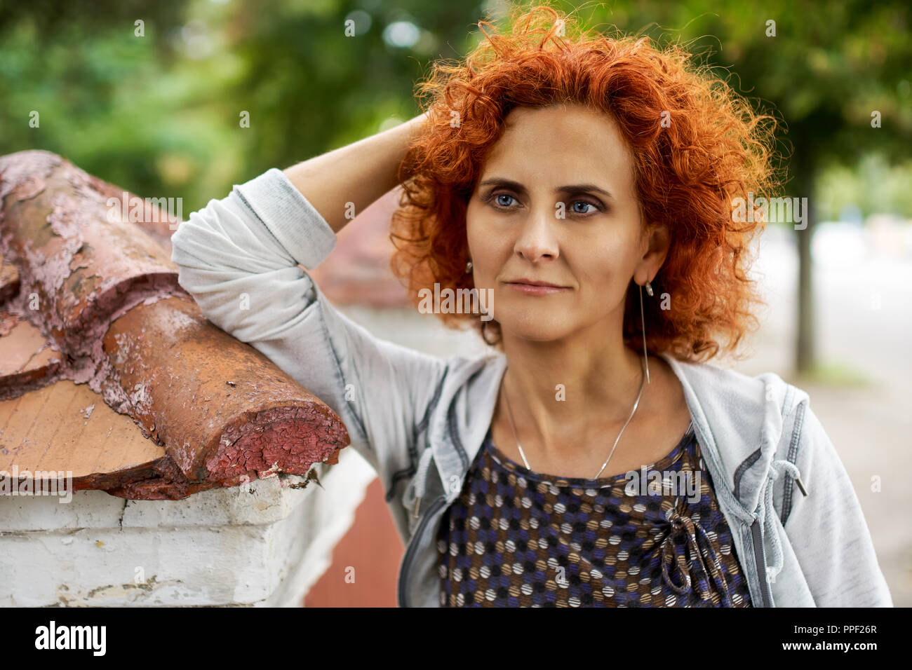 Candid portrait curly redhead woman hi-res stock photography and images ...