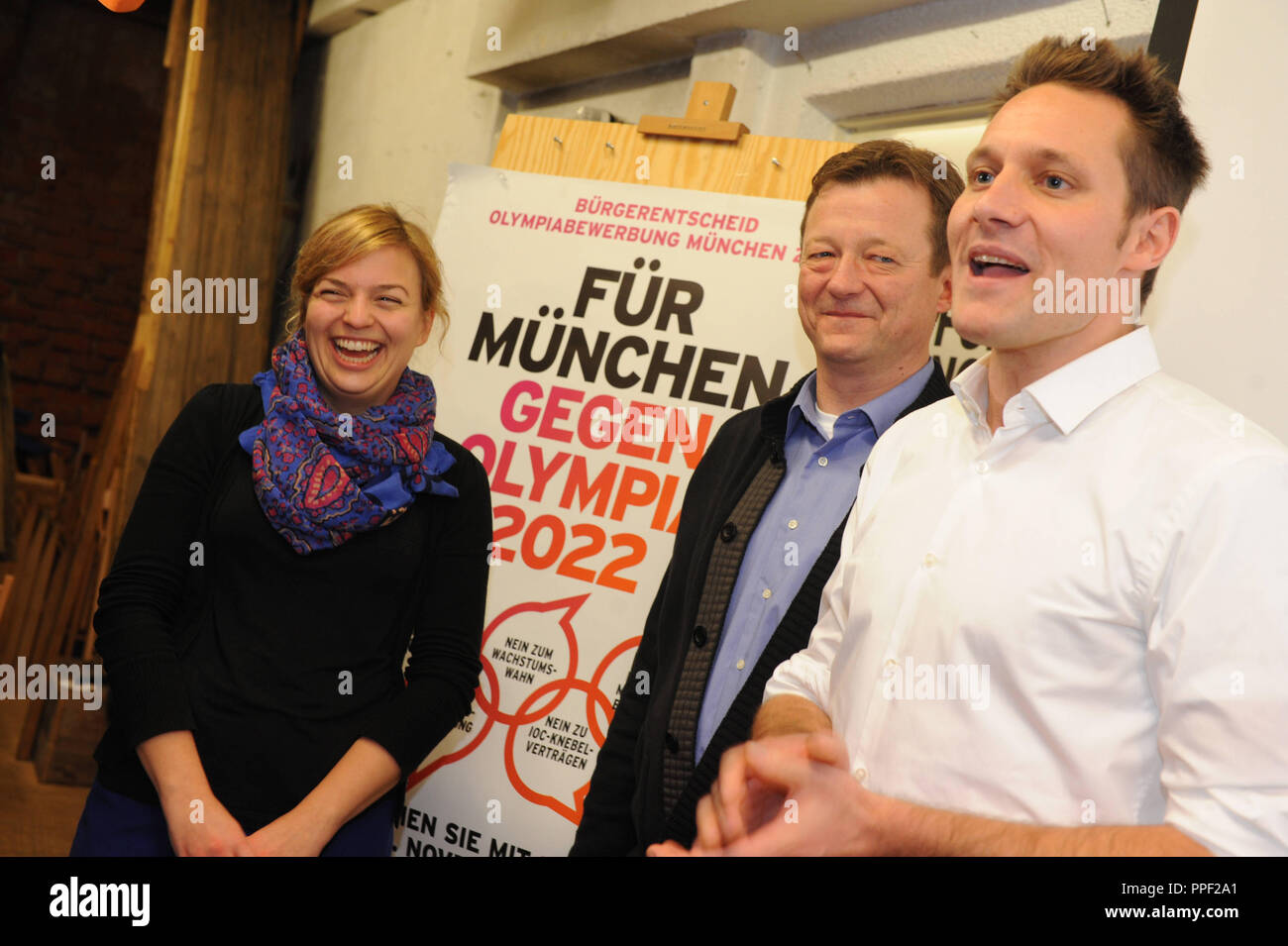 Christian Hirneis (in the middle, from Friends of the Earth Germany), Catherine Schulze and Ludwig Hartmann (Greens) celebrate the outcome of the citizens vote on the Munich Olympic bid for the 2022 Winter Games, Munich, Germany Stock Photo