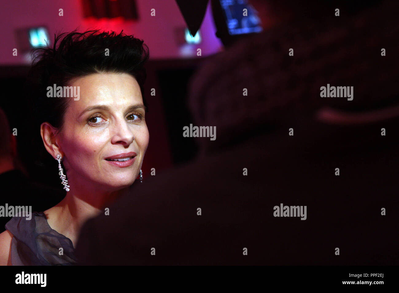 Candy manufacturer Ferrero ('Mon cheri') celebrates Barbara day at Postpalast in Munich, Germany. It's a night of fundraising for a children's foundation. Portrait of french actress Juliette Binoche Stock Photo